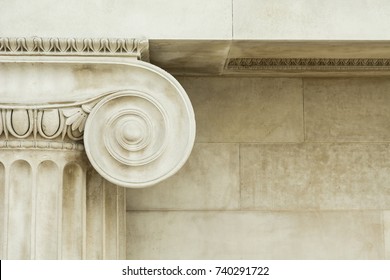 Decorative detail of an ancient Ionic column. close up. - Shutterstock ID 740291722