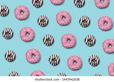 Decorative Donuts Seamless Patterm On Blue Background