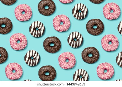 Decorative Donuts Seamless Patterm On Blue Background