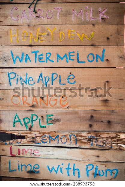 Decorative Drinks\
Menu. Chalk wrote on wood\
board.