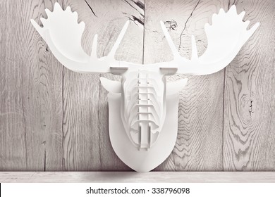 Decorative Elk Head On Wooden Background