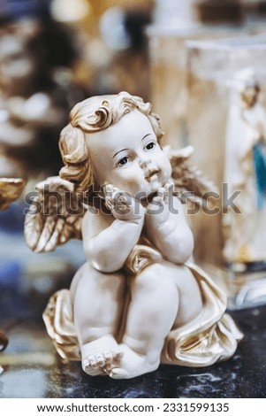 Decorative figurine of a cute cherub angel