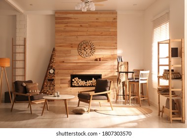 Decorative Fireplace With Stacked Wood In Cozy Living Room Interior