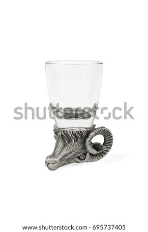 Decorative glass of an inverted ram head on the bottom isolated on a white background