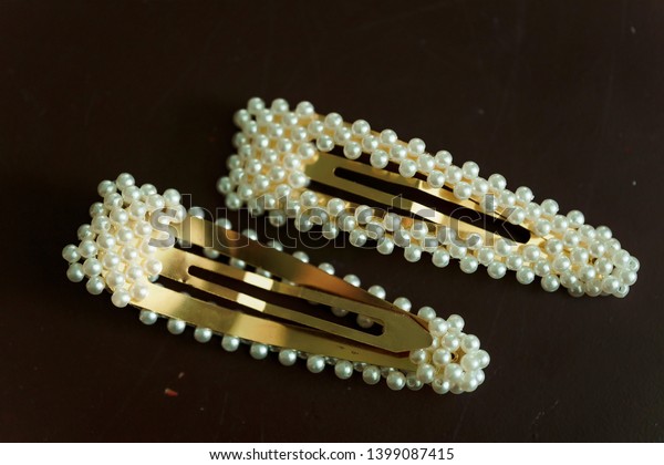 Decorative Hair Clips On Brown Background Stock Photo Edit Now