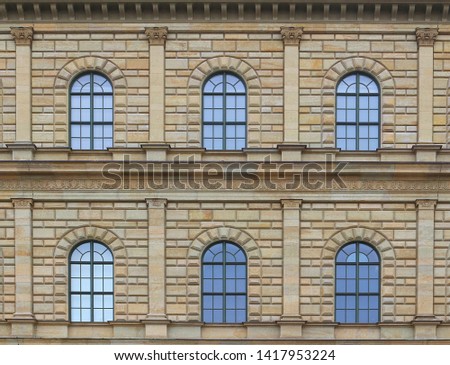 Decorative historic stone house front in Munich (Germany)