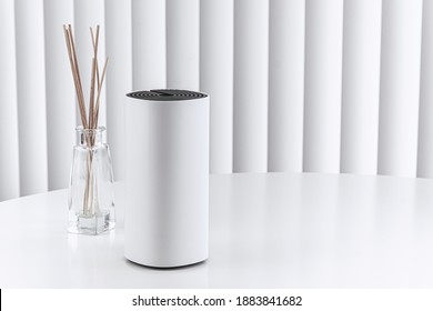 Decorative Home WiFi Router On White Table, Vertical Blinds. 