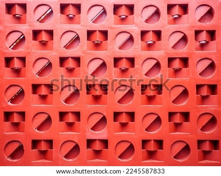 Decorative house wall of roster, interesting texture pattern for architectural design.