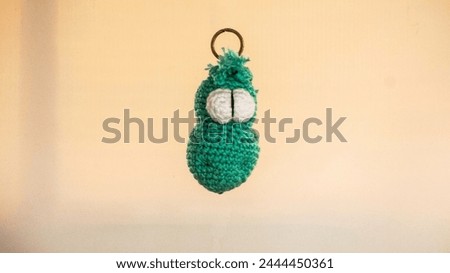 Decorative knitted pendants on the subject of Pascal.
