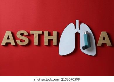 Decorative Lungs, Inhaler And Word Asthma On Red Background