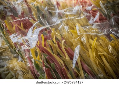 Decorative multicolored artisan pasta in a store - Powered by Shutterstock