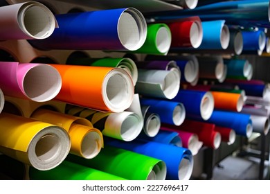 Decorative multicolored film for window dressing. Plotter cutting on film. Production of interior advertising and window dressing. Vinyl self-adhesive film. - Shutterstock ID 2227696417