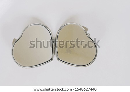 Decorative objects in pairs in the shape of a heart