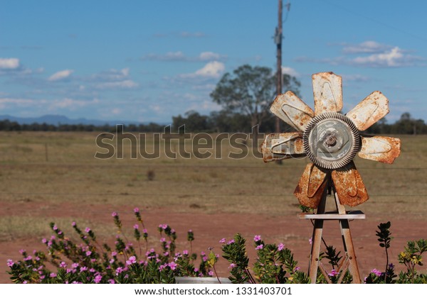 Decorative Outdoor Farm Windmill Barren Landscape Royalty Free