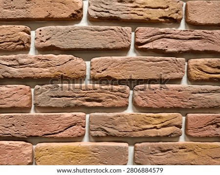 Decorative panels replicating brick stone and tile textures shown in a hardware store aisle for versatile renovation and construction projects
