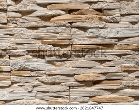 Decorative panels replicating brick stone and tile patterns shown in a construction store section for versatile renovation and design enhancement