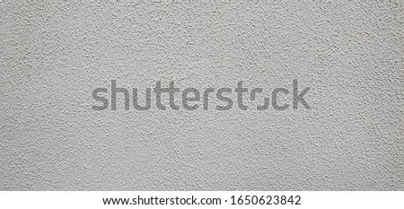 decorative plaster to create a fur coat effect, textured wall surface.