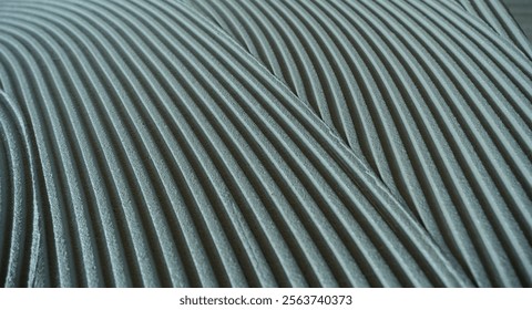 Decorative plaster is creating a wavy pattern, perfect for backgrounds and textures