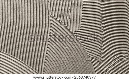 Decorative plaster is creating a wavy pattern, perfect for backgrounds and textures