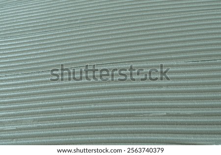 Decorative plaster is creating a wavy pattern, perfect for backgrounds and textures