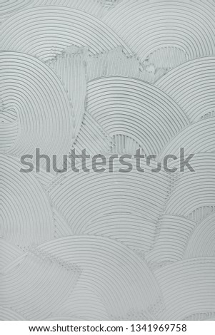 Decorative plaster wall finish texture, modern urban wavy overlapping concentric circle pattern background