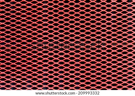 Decorative radiator cap. Red. Abstract mesh. Grille.