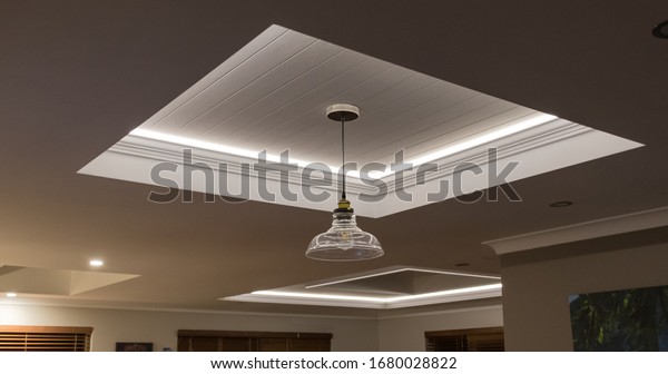 Decorative recessed ceiling with LED strip\
lighting (Secret\
Lighting)
