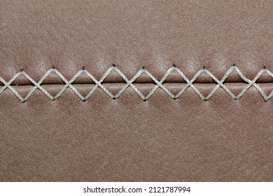 decorative seam on calfskin made of nylon thread