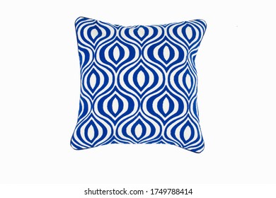 Decorative soft pillow, with geometric pattern in blue and white color, isolated on white background.