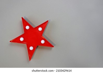 Decorative star with lamps. Stylish star shaped glowing night lamp. Space for text.