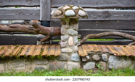 A Decorative Stone Fence Post For Delimiting A Private Area