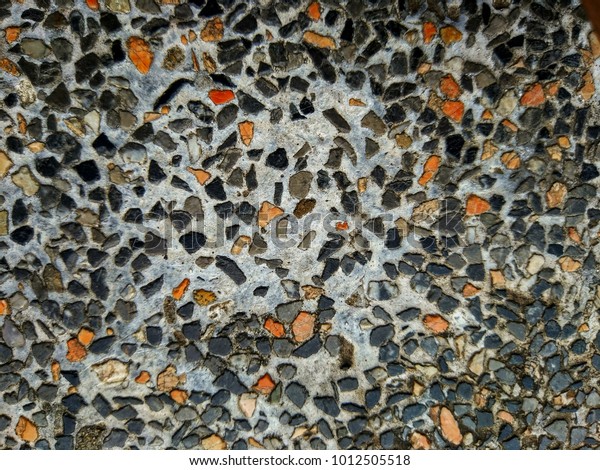 Decorative stone floor.serving to make\
something look more attractive;\
ornamental.