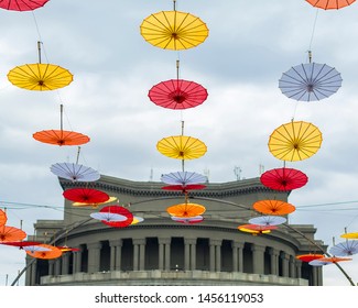 Decorative umbrellas in front of the old building of Yerevan Opera Theatre, Armenia