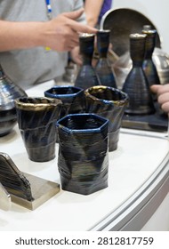 Decorative vase created using 3D metal printing. Metal model printed on 3D printer. Additive manufacturing from melted metal thread. Additive manufacturing. Object printed on 3D printer from metal