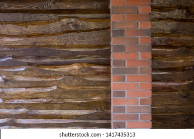 Decorative Wall Of Pine Boards Painted With Varnish. Wood Texture. Brick Column.