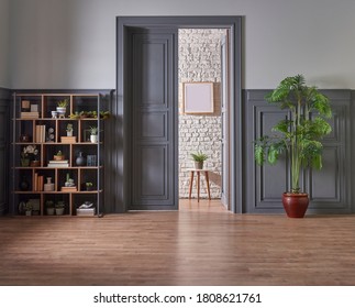 Decorative Wooden Bookshelf In The Classic Grey Wall And Door Style, Lamp Frame And Vase Of Green Plant.