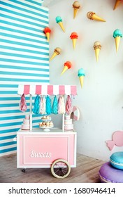 Decorative Wooden Cart With Pink And Blue Candy Bar In The Studio