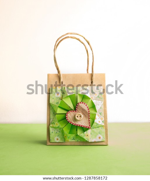 Decorative Wooden Heart On Origami Flower Stock Photo Edit Now