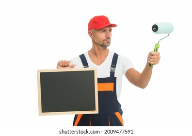 Decorator Holds School Blackboard And Paints Roller. Painter Training School. Vocational And Technical School. Welcome To The School Of Painting, Copy Space