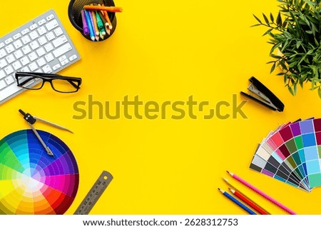 Decorator workspace flat lay. Creative designers table with color paint swatches.