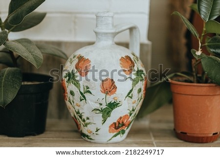 Decoupage or découpage is the art of decorating an object by gluing colored paper cutouts onto it in combination with special paint effects, gold leaf and other decorative elements. Ukrainian art