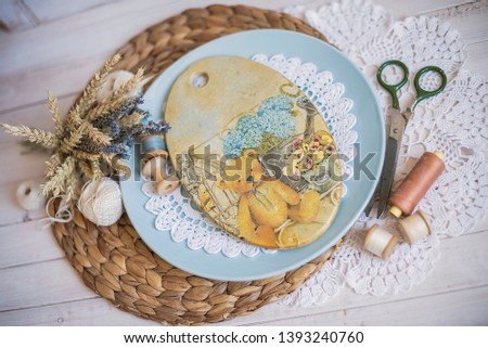decoupage boards on a blue plate