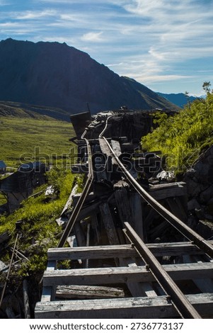 A decrepit rail line at a mine.
