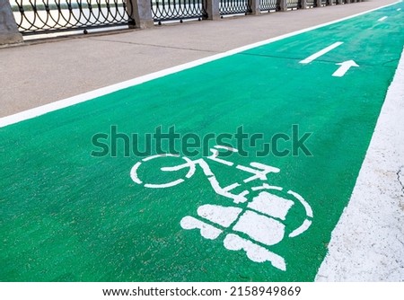 Dedicated bicycle lane with bicycle and roller skates sign, designed to make cycling safer on the asphalt road