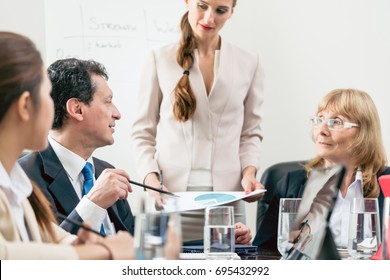 Dedicated Manager Sharing His Opinion While Interpreting A Pie Chart During Board Of Directors Meeting In The Conference Room Of A Prosperous Company 