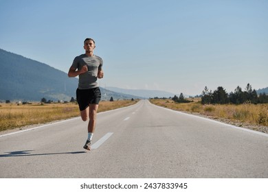 A dedicated marathon runner pushes himself to the limit in training. - Powered by Shutterstock