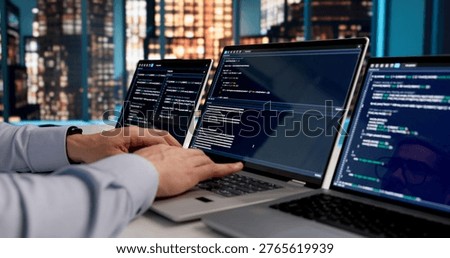 Dedicated Software Developer Immersed In Coding Web Applications At Office Desk