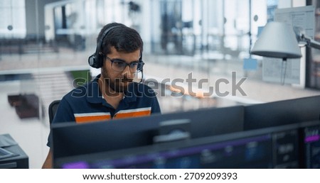 Dedicated Software Engineer Coding Ai Solutions on Dual Monitors in a Modern Office. Showcases Programming Proficiency, Innovation, and Focus in Artificial Intelligence and Software Development.