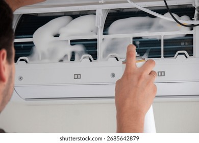 Deep AC Cleaning. Treating the Evaporator with Cleaning Foam.