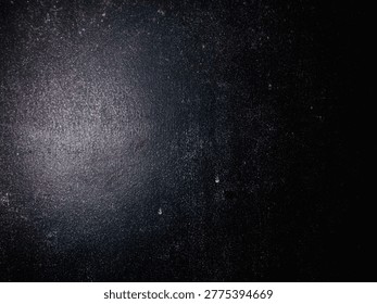 Deep black background with soft light, elegant and modern backdrop. 